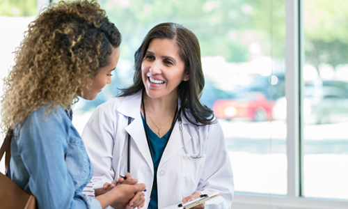 clinical trial site doctor speaking with participant