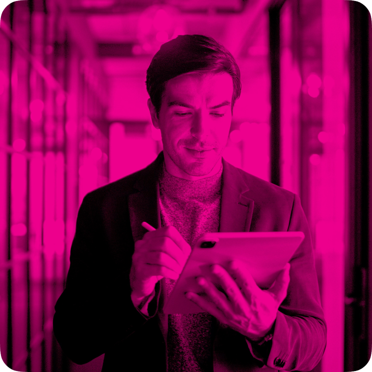 Individual using a digital pen on a tablet, symbolizing YPrime’s commitment to quality management, GxP compliance, and data integrity in clinical research.